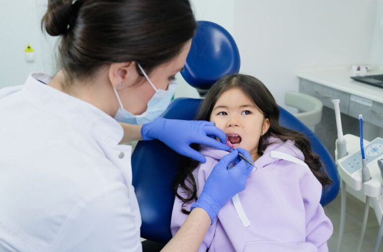 A young patient having a check up with the hygienist
