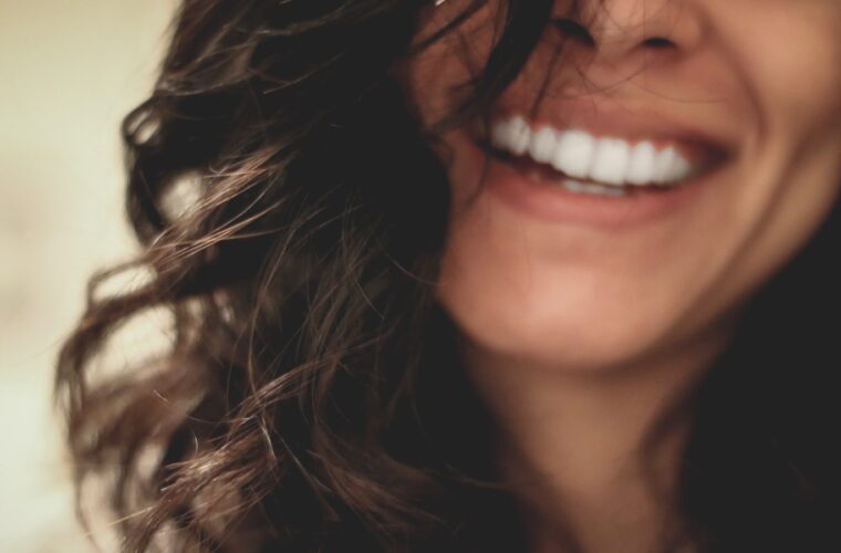 A patient's teeth being prepared for a whitening treatment